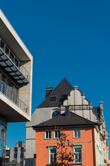old and new architecture in Hilden before blue sky
