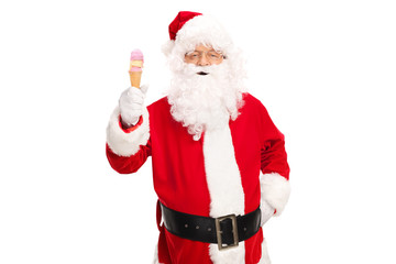 Santa Claus holding an ice cream cone