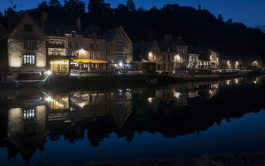 Fototapeta na wymiar Night View of The Quayside and Reflections at Dinan, Brittany, F