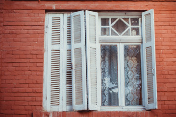 Old traditional wooden window captured in Korca, a small town situated in south east of Albania.
