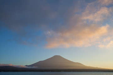 Mountain Fuji and cloud with beautiful sunset sky at lake Yamanakako in summer evening