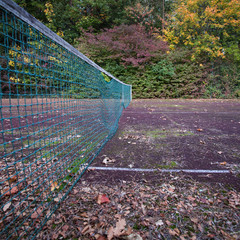 old abandoned tennis court