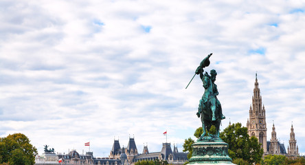 Fototapeta premium statue of Archduke Charles and towers of Rathaus