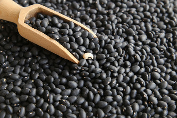 Black beans with wooden scoop