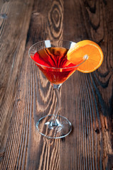 Made Spritz with aperol, soda and prosecco on wooden background