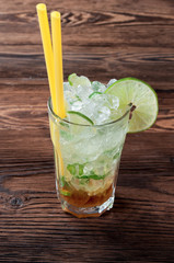 Cocktail Mojito on wooden table