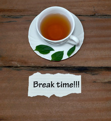 A Cup Of Tea With Text Break Time On Wood Background.Concept Pho