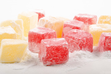 sweet pieces of turkish delight with powdered sugar