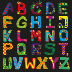 many colorful letters on black background