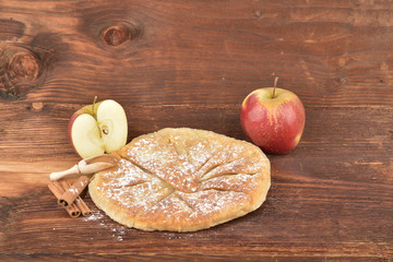 Sweet homemade apple pie with cinnamon and sugar