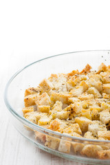 Small croutons with pepper  on the glass  dish at  the right of the table