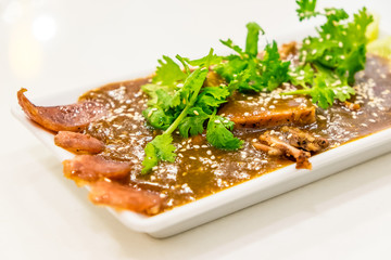 Barbecued red pork in sauce