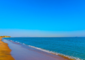 the beautiful long sandy beach at Chelona cape near Kardamaina village at Kos island in Greece
