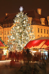 Christmas Mood on the night snowy Old Town Square, Prague, Czech Republic