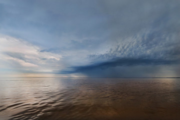 Storm Clouds at the Sea Background. Horizon.