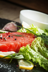 Salmon fillet with spices, herbs and seasonings, selective focus