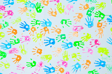 colorful hand prints on a wall