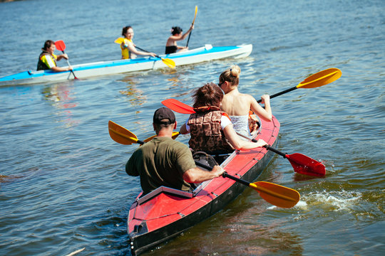 People of all ages in a kayak. Family holiday.