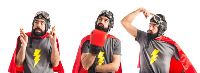 Super hero thinking over white background