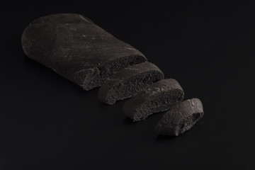 Black bread made with flour and vegetal coal