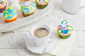 Sweet muffins with sweet decoration and coffee
