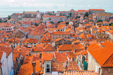 Fototapeta na wymiar Red roofs of houses in old town Dubrovnik, Croatia, panoramic view 
