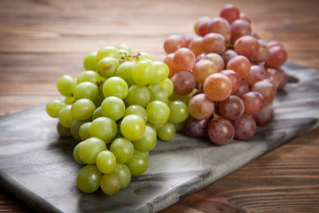 Delicious grapes on a kitchen table