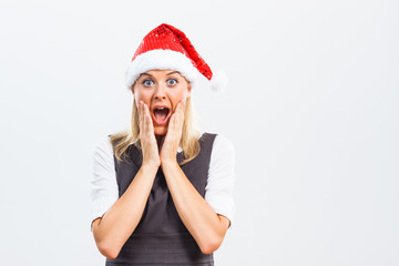 Excited business woman with Santa Hat