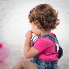 Baby in studio with balloons
