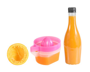 juicer with orange juice in the bottle isolated on white