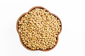 soybeans in wooden bowl isolated on white background..