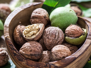 Walnuts in the wooden bowl.