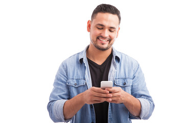 Attractive man using a smartphone