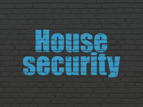 Safety concept: House Security on wall background