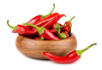 Red hot chili peppers in wooden bowl