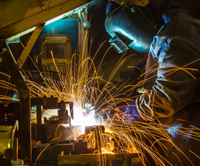 welder movement Industrial automotive part in factory