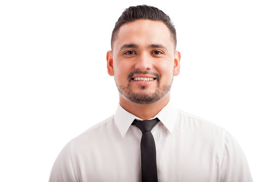 Hispanic man wearing a tie