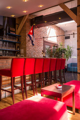 Red bar stools in nightclub
