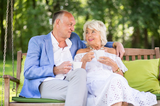 Mature woman relaxing with partner