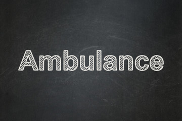 Obraz premium Medicine concept: Ambulance on chalkboard background
