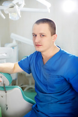 Fototapeta premium Young dentist etaying in the dentist office