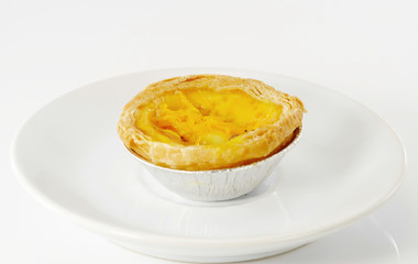 Coconut pie/Coconut pie on white dish.