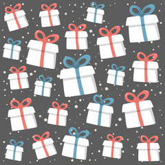 Christmas background made from christmas presents with red and blue ribbons on the snowing background.