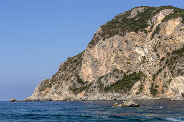 Fototapeta na wymiar Ionian seashore with blue water and sky
