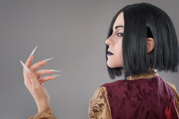 Gothic woman with chinese nails / Dark gothic woman with cloak and chinese nails