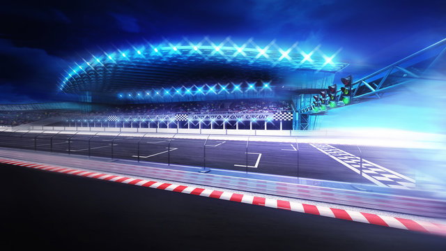 finish line gate on racetrack with stadium in motion blur