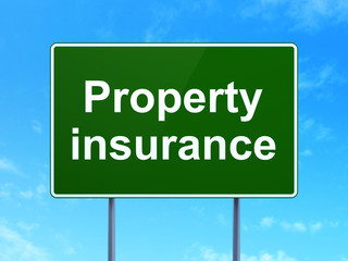 Insurance concept: Property Insurance on road sign background