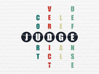 Law concept: Judge in Crossword Puzzle