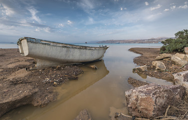 Beached boat after storm