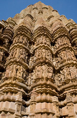 Fototapeta na wymiar A fragment of the Indian temple of Khajuraho. World Cultural Heritage by UNESCO. India.